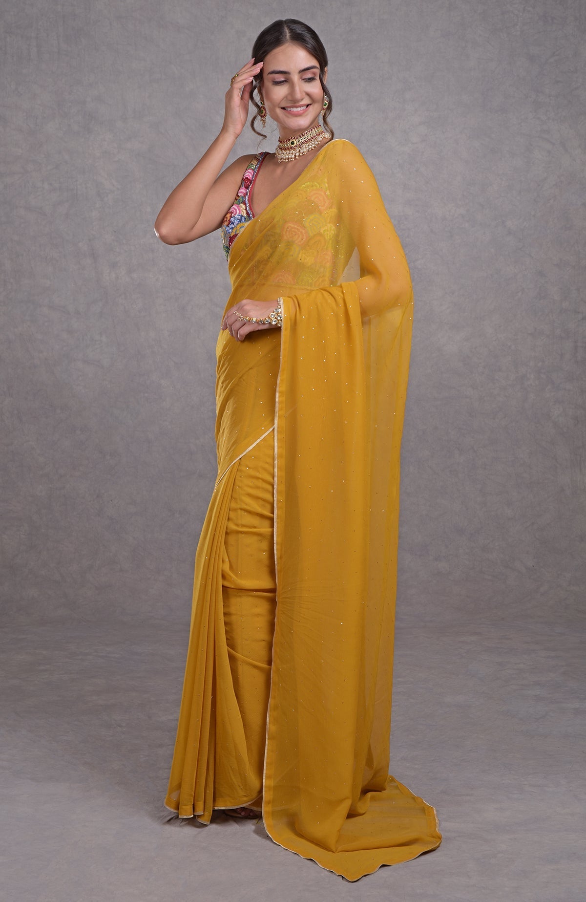 Mustard yellow saree with multicolor resham, dabka, sequin, beads, and kamdani embroidery