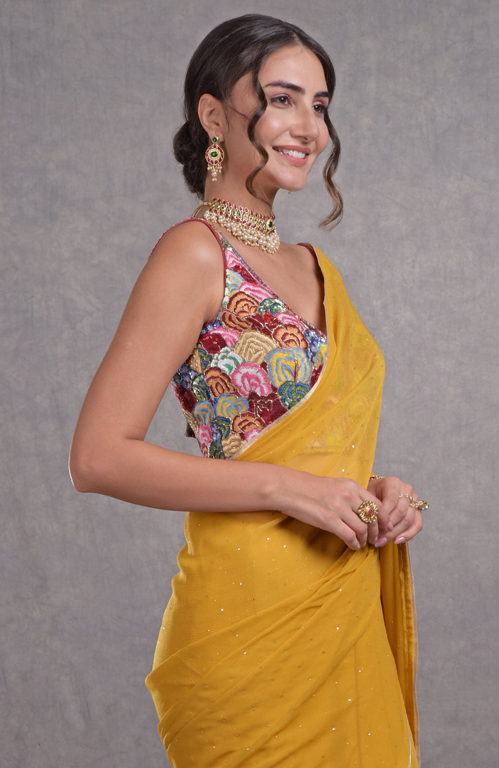 Mustard yellow saree with multicolor floral resham, dabka, sequin, bead, and kamdani embroidery