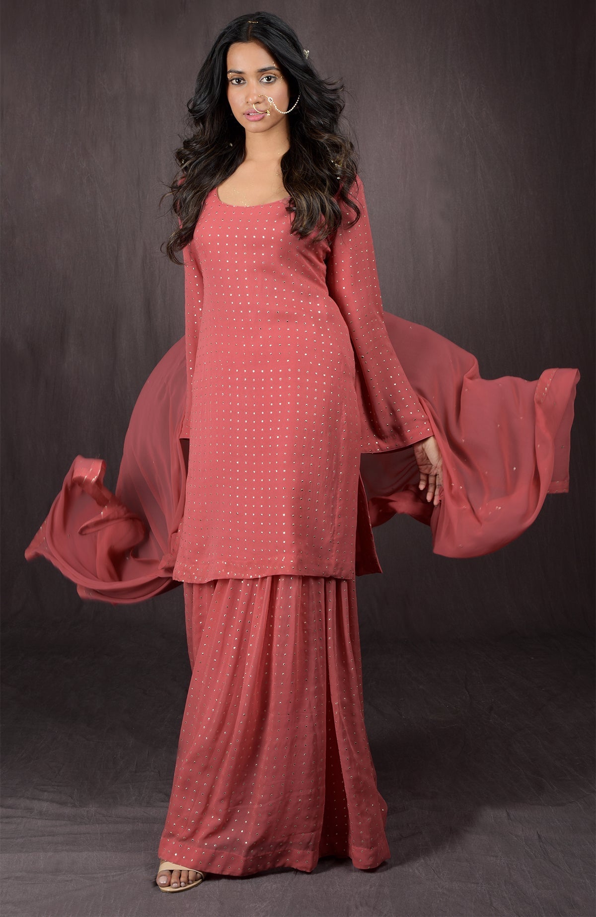 Desert Rose gold embellished georgette sharara set with scoop neckline and sequin dupatta.