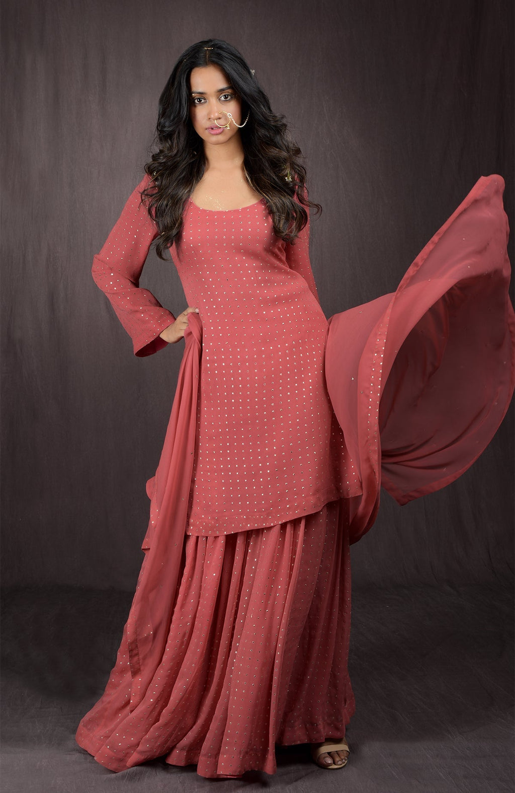 Desert Rose sharara set in georgette with gold embellishments on kurta, sharara, and dupatta.