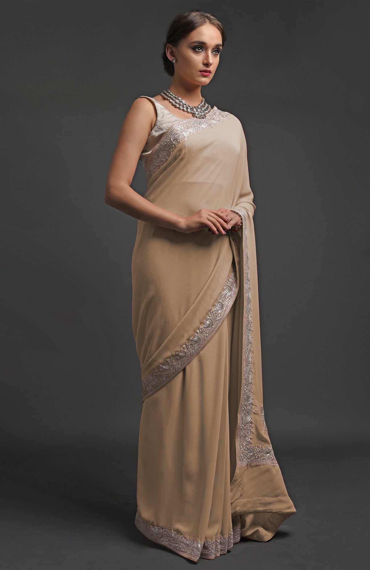 Navy blue georgette saree with silver Kashmiri tilla lotus embroidery on pallav and borders