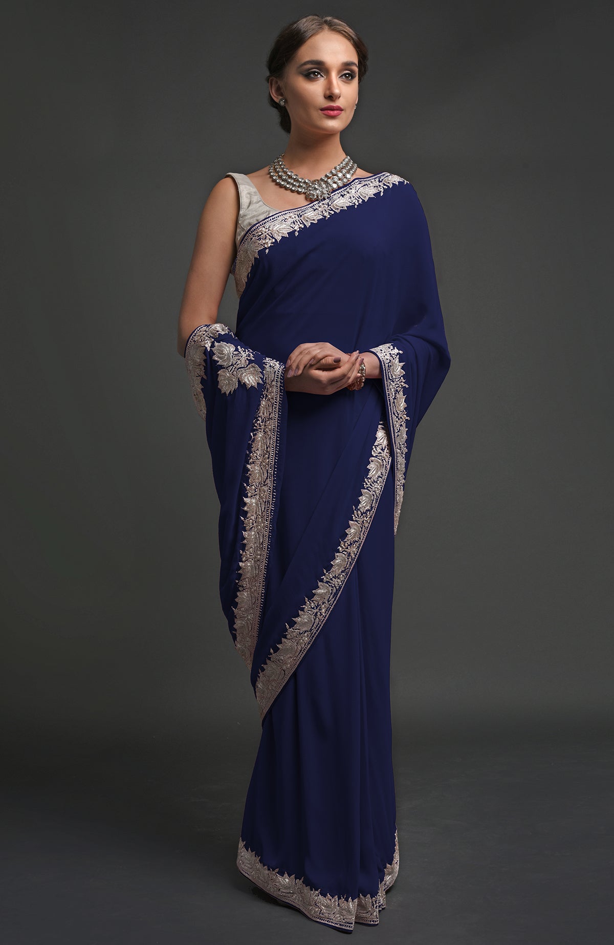 Plum georgette saree with silver Kashmiri tilla lotus embroidery on pallav and borders