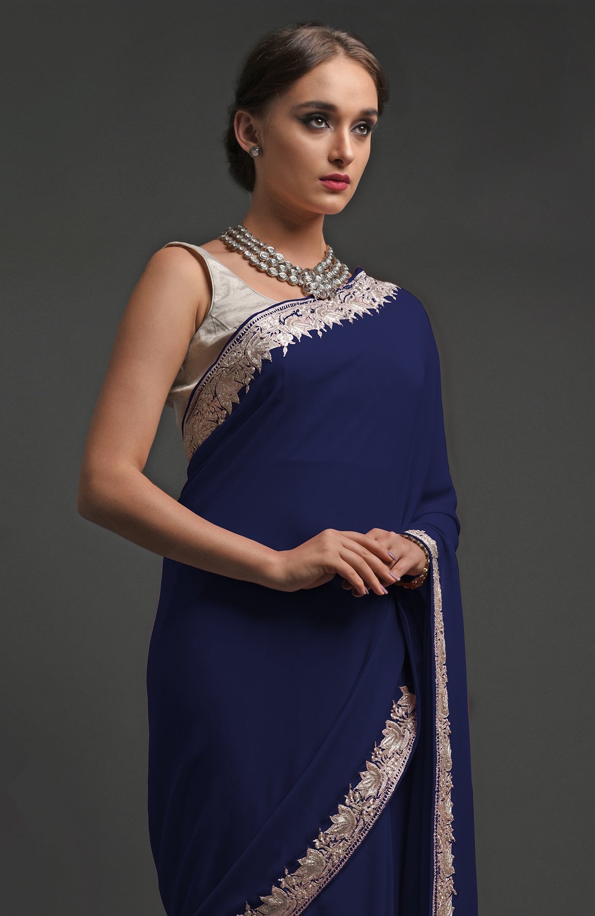 Navy blue georgette saree with silver Kashmiri tilla lotus embroidery on borders and pallav