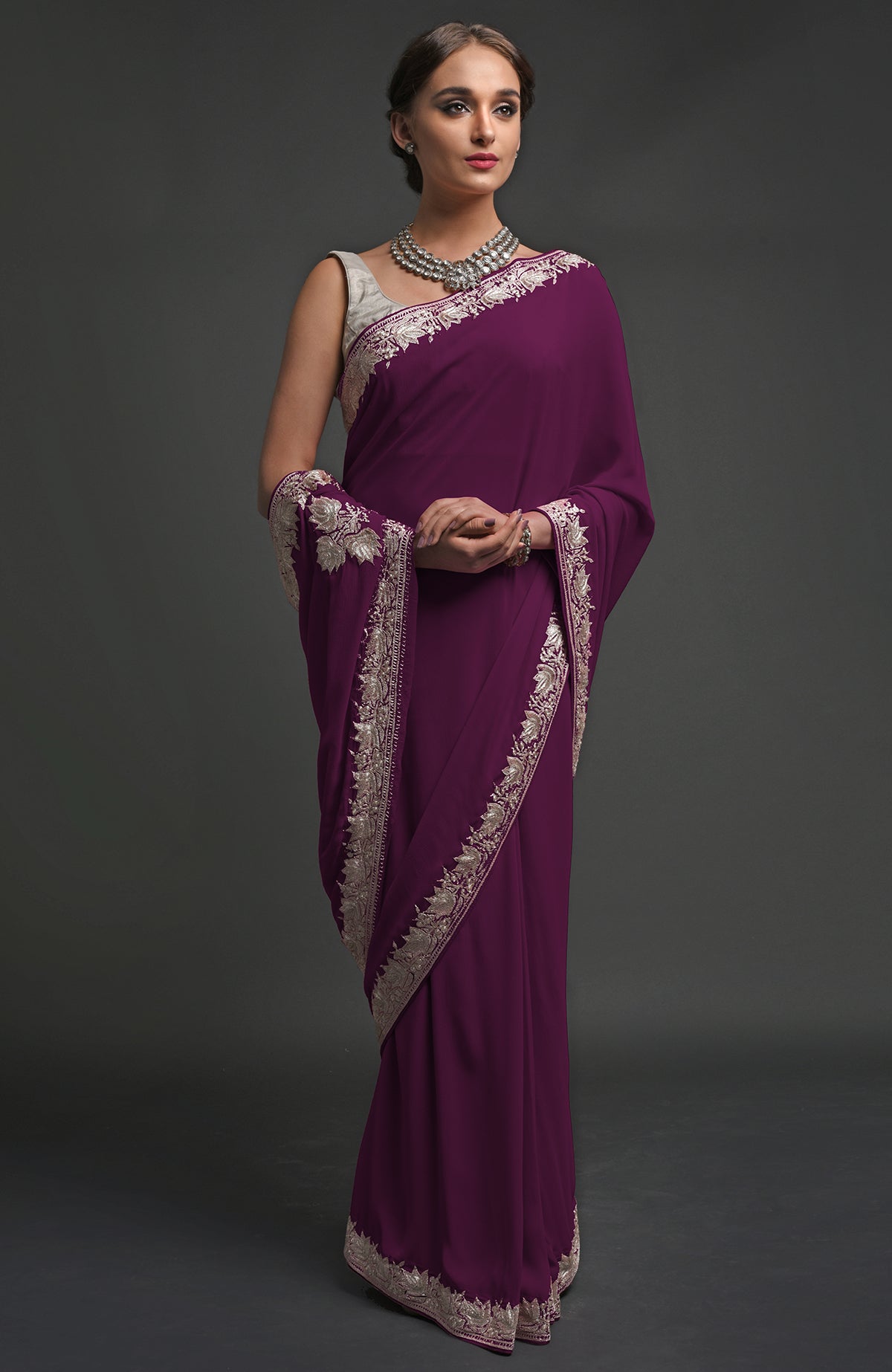 Plum georgette saree with silver Kashmiri tilla lotus embroidery on pallav and borders