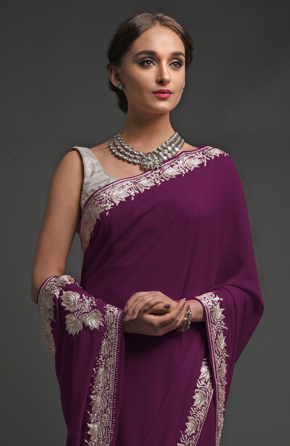 Plum georgette saree with silver Kashmiri tilla lotus embroidery on pallav and borders