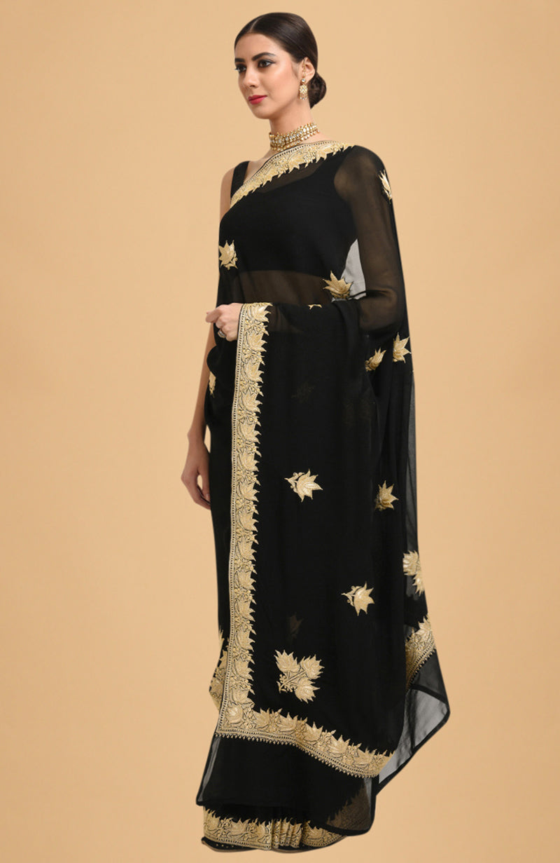 Black georgette saree with gold Kashmiri tilla lotus embroidery on pallav and borders