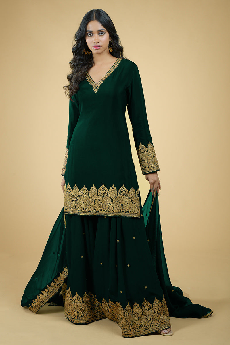 Emerald green crepe sharara set with gold Kashmiri Tilla Aari floral and paisley embroidery
