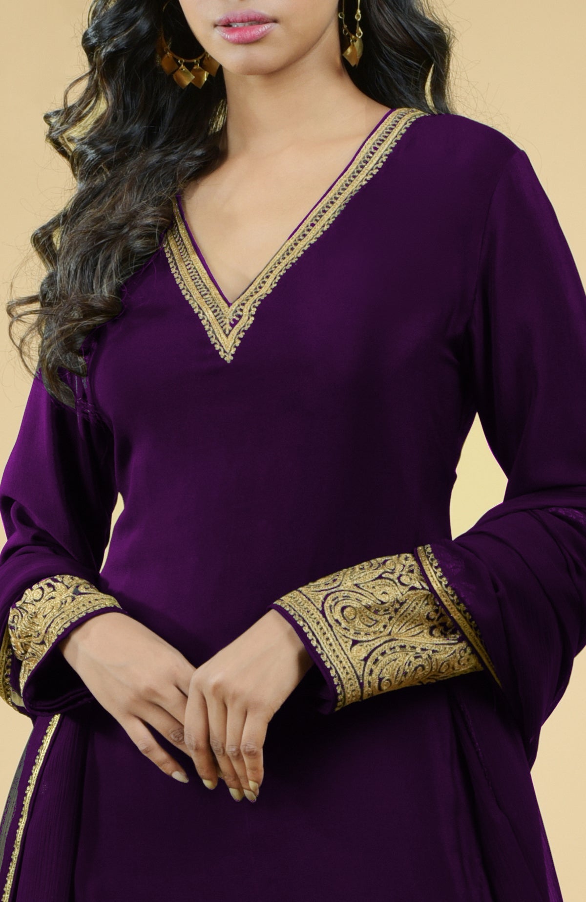 Plum crepe sharara set with gold Kashmiri tilla aari floral and paisley embroidery.