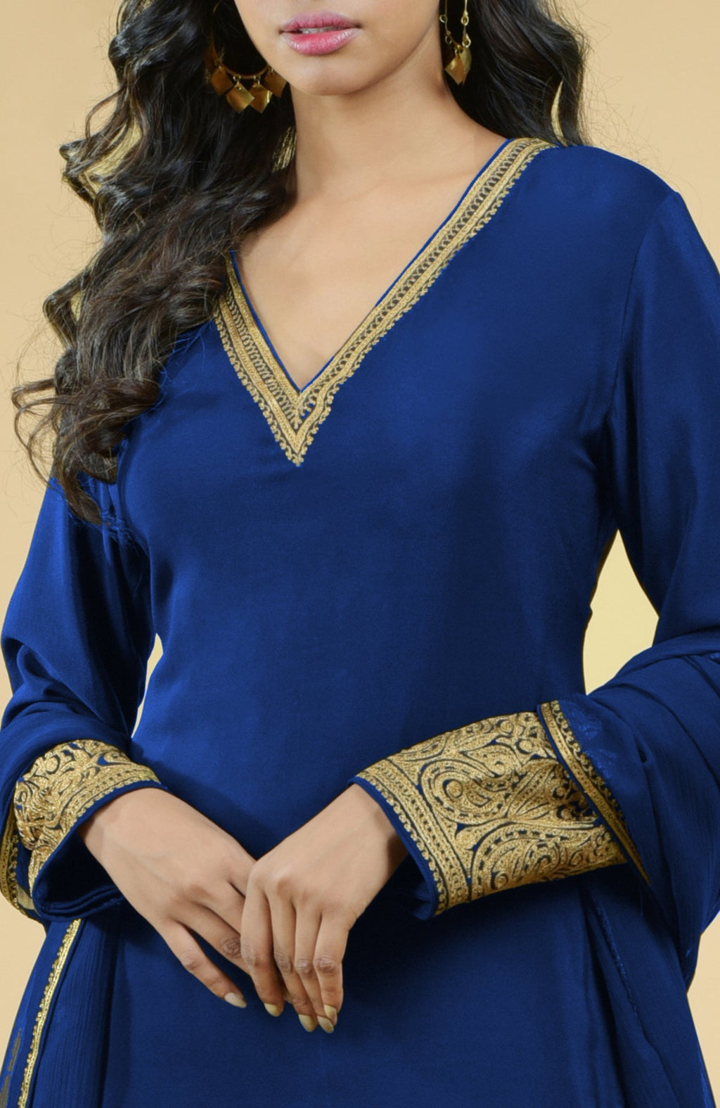 Cobalt blue sharara set with gold Kashmiri tilla aari floral and paisley embroidery.