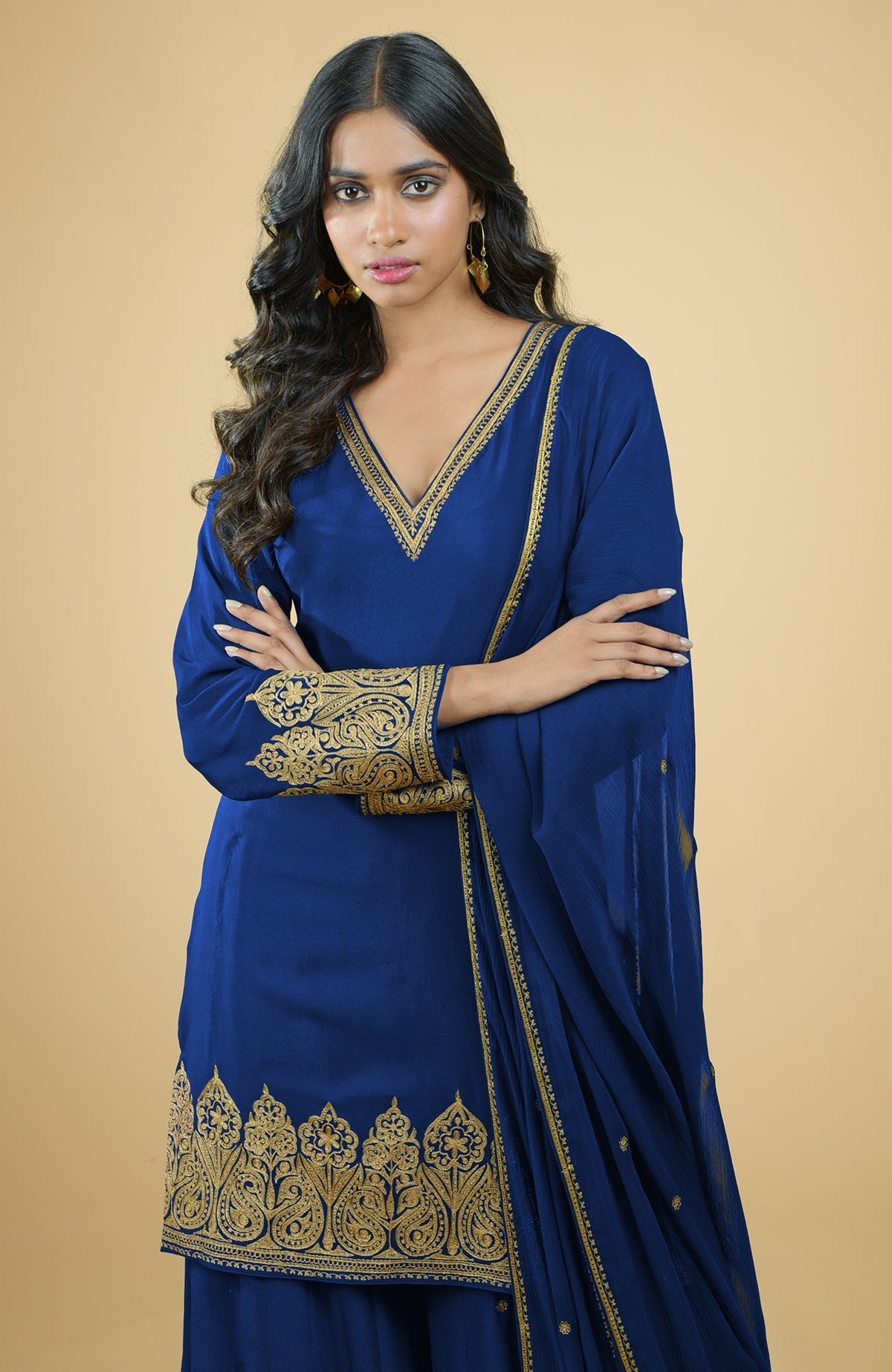 Cobalt blue crepe sharara set with gold Kashmiri tilla aari floral and paisley embroidery.