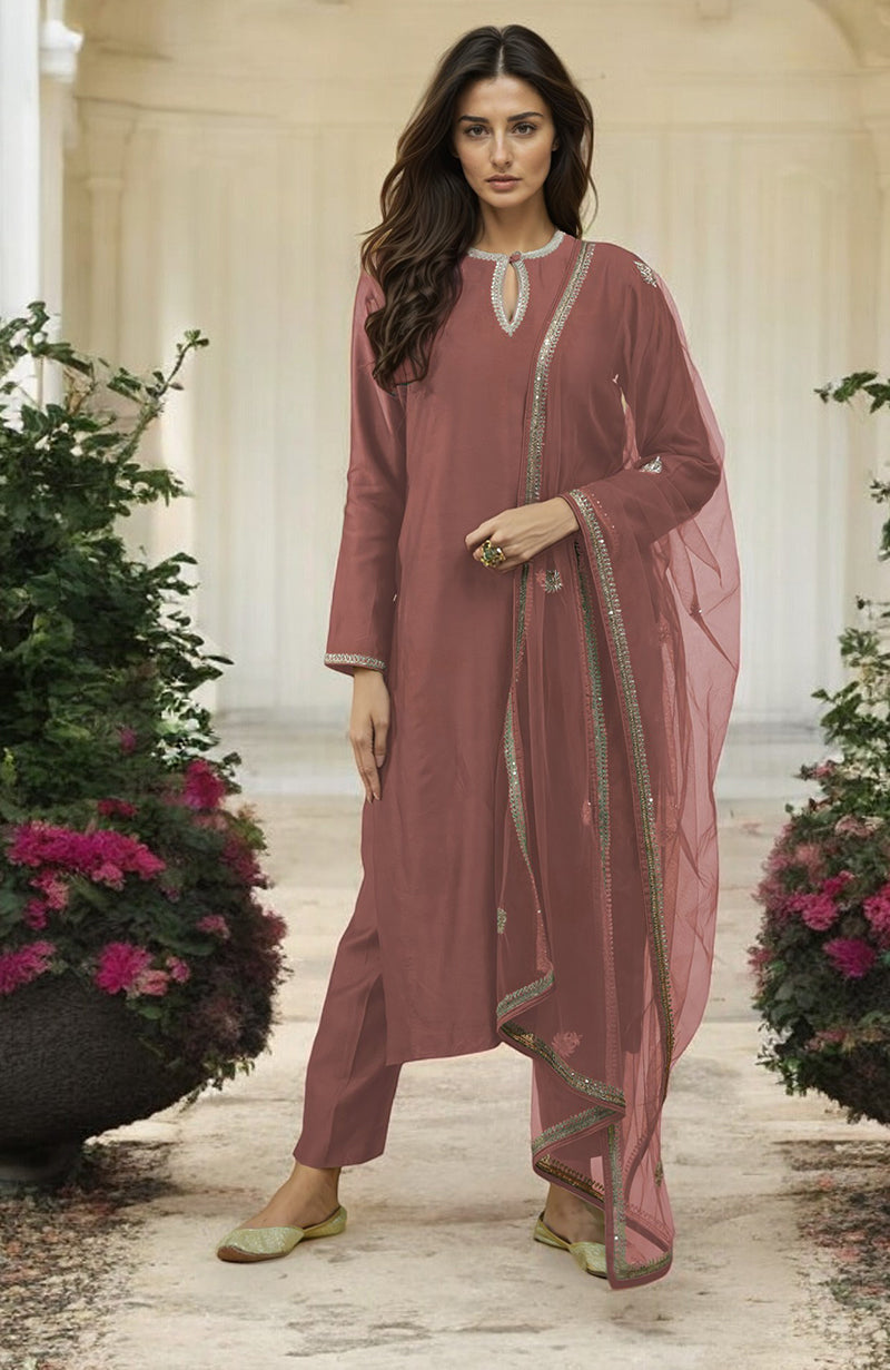 Emerald green kurta set with gold hand-embroidered zardozi floral work and matching pants