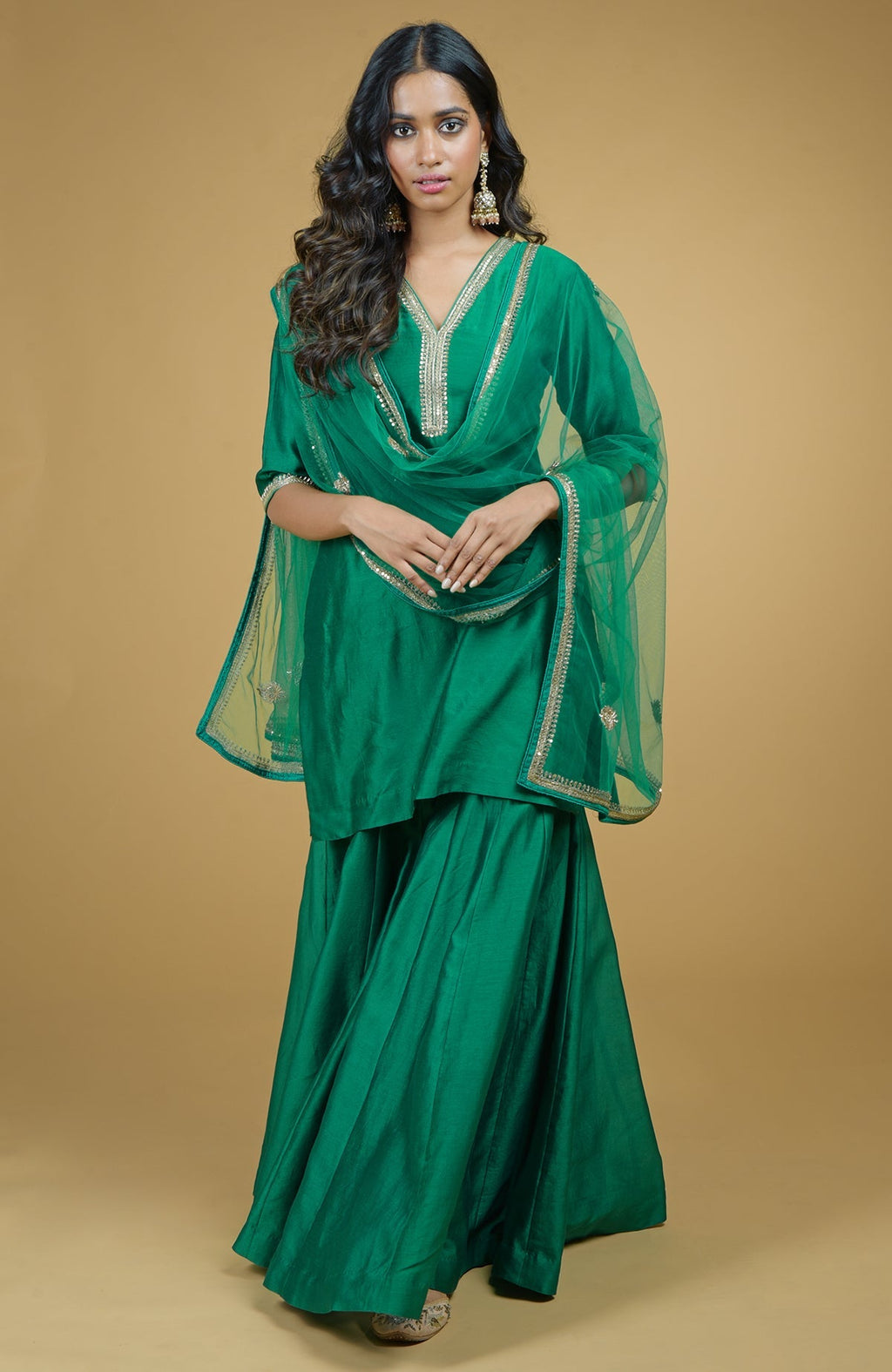 Emerald green Gharara set with hand-embroidered gold zardozi floral work on silk fabric