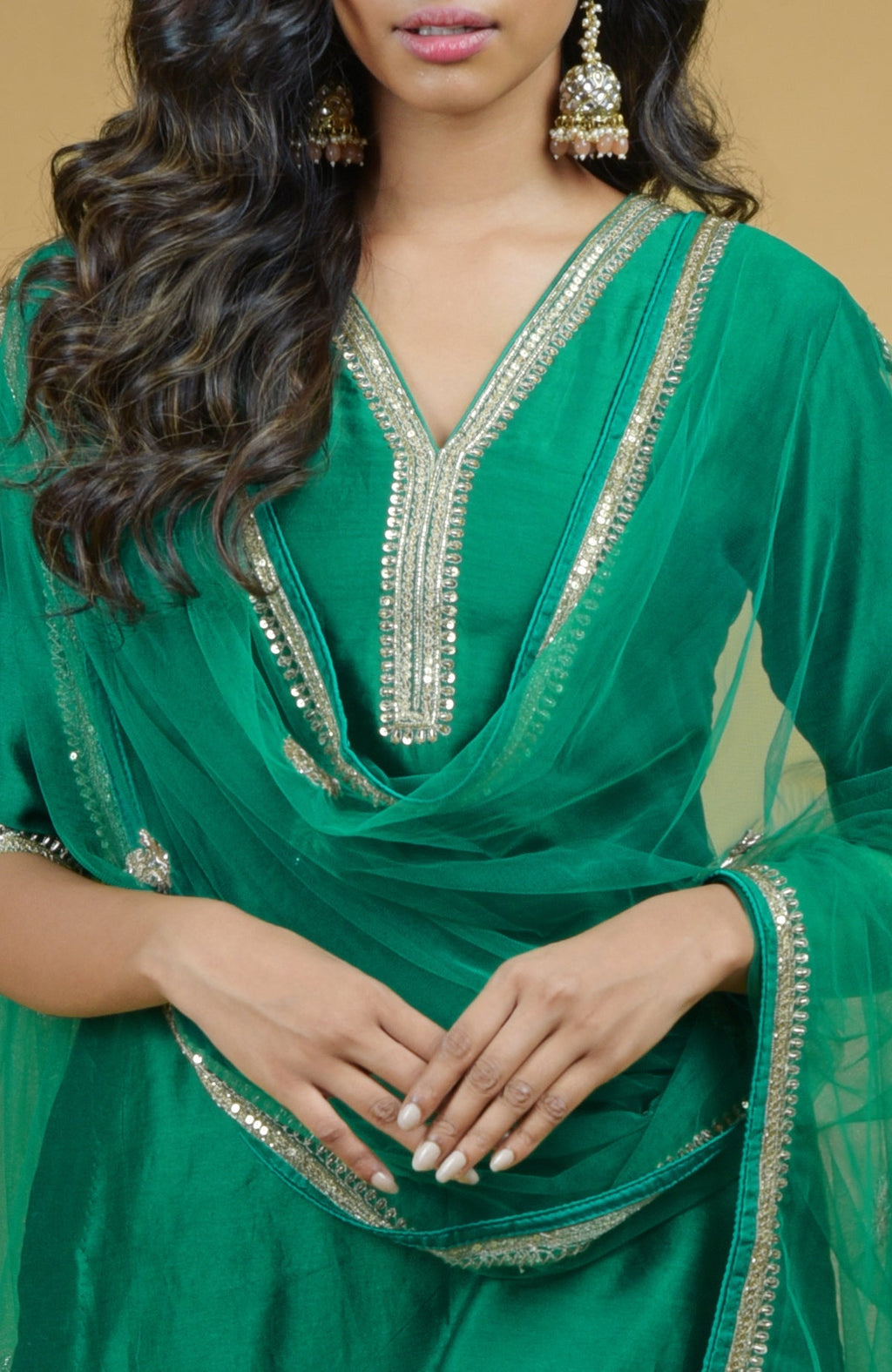 Emerald green Gharara set with hand-embroidered gold zardozi floral work on silk fabric