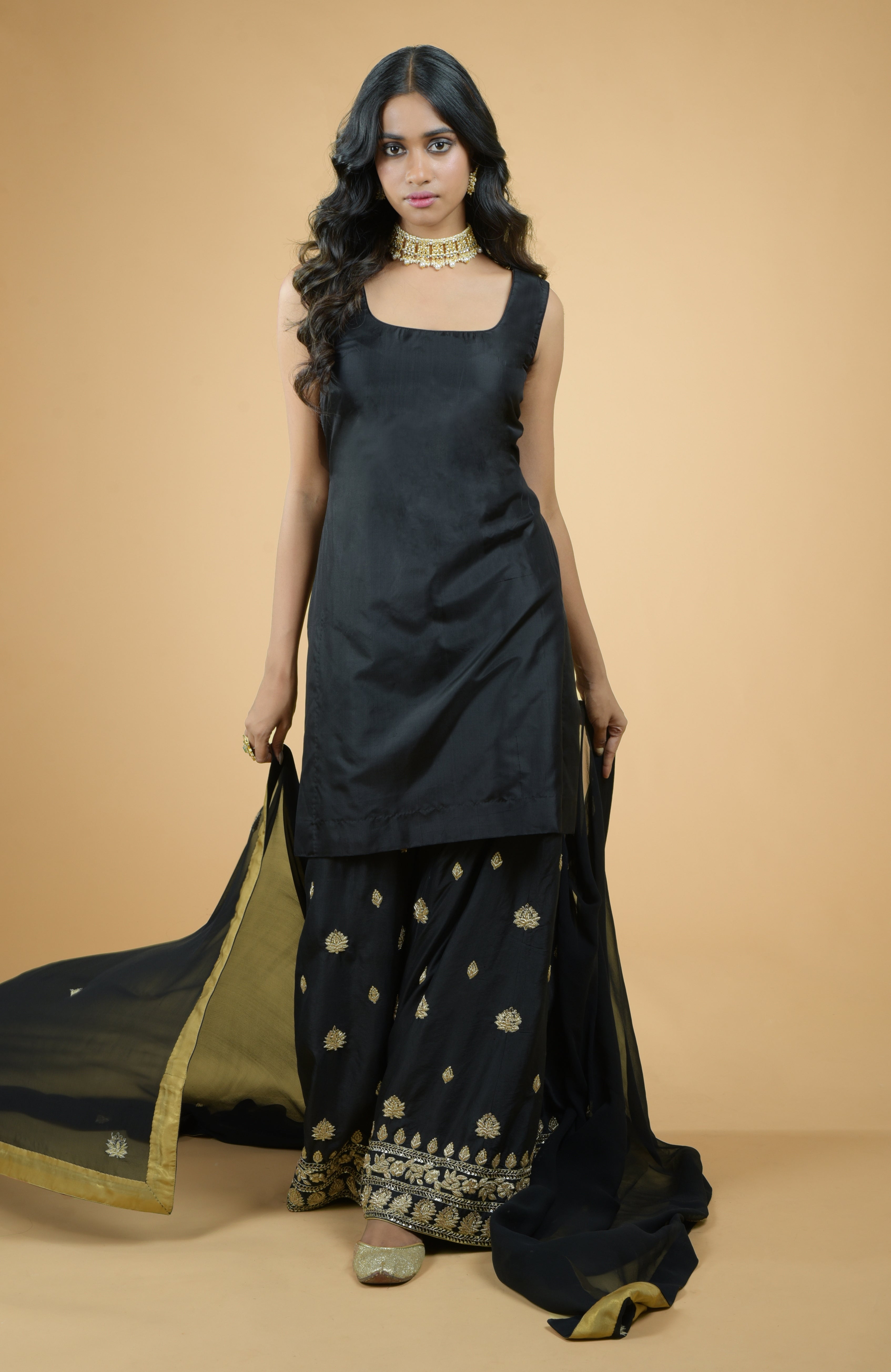 Emerald green silk sharara set with gold zardozi dabka and sequin hand embroidery
