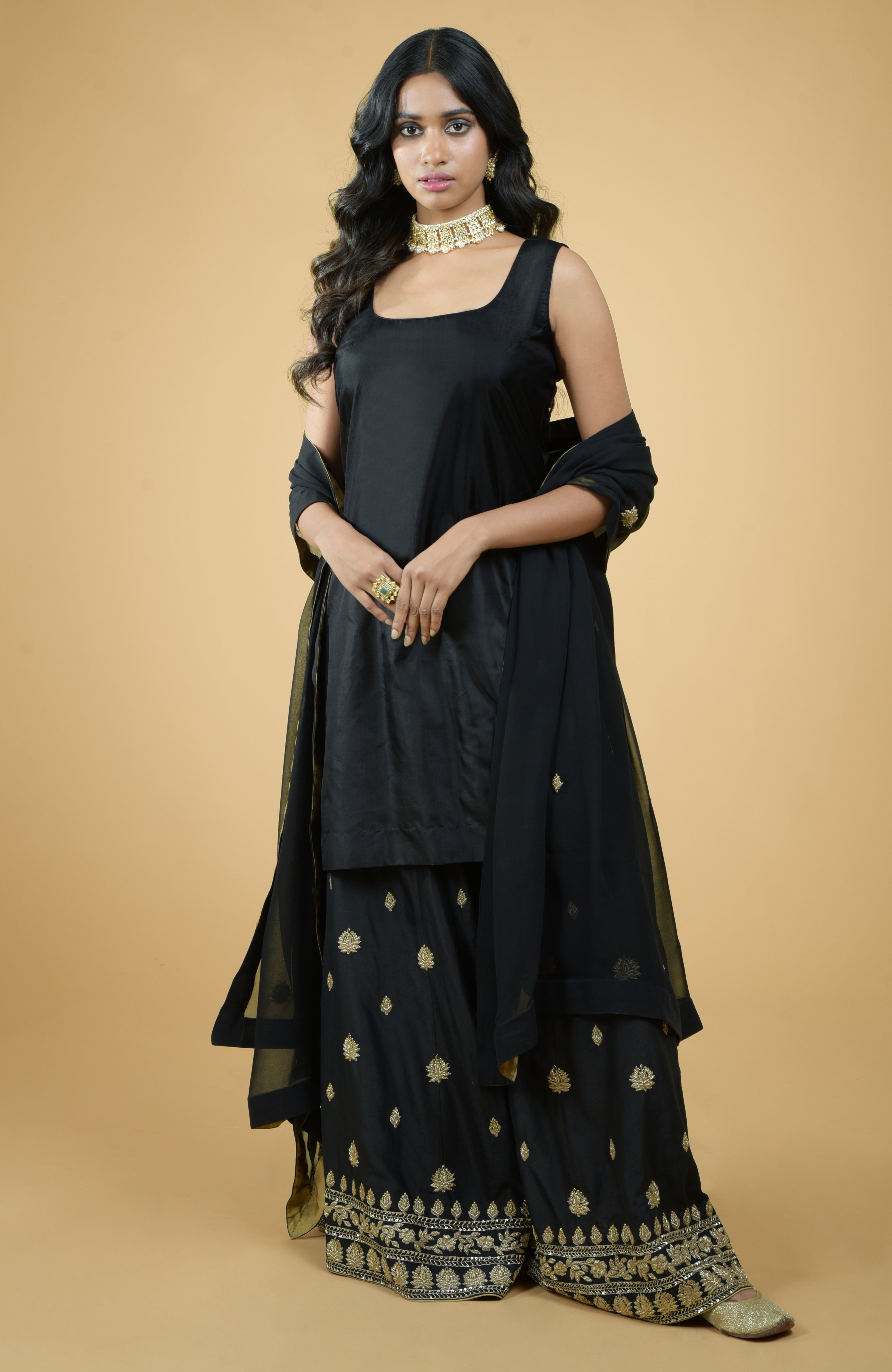 Black silk sharara set with gold zardozi dabka floral embroidery and georgette dupatta