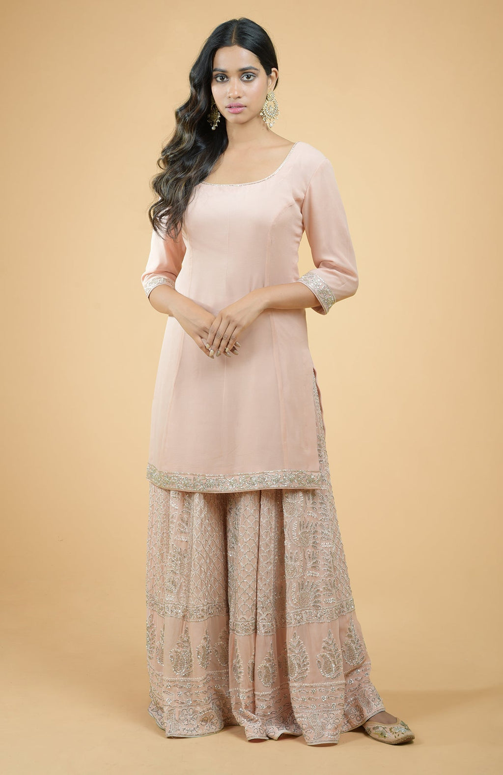Nude pink sharara set with hand-embroidered chikankari, beads, and sequin zardozi details