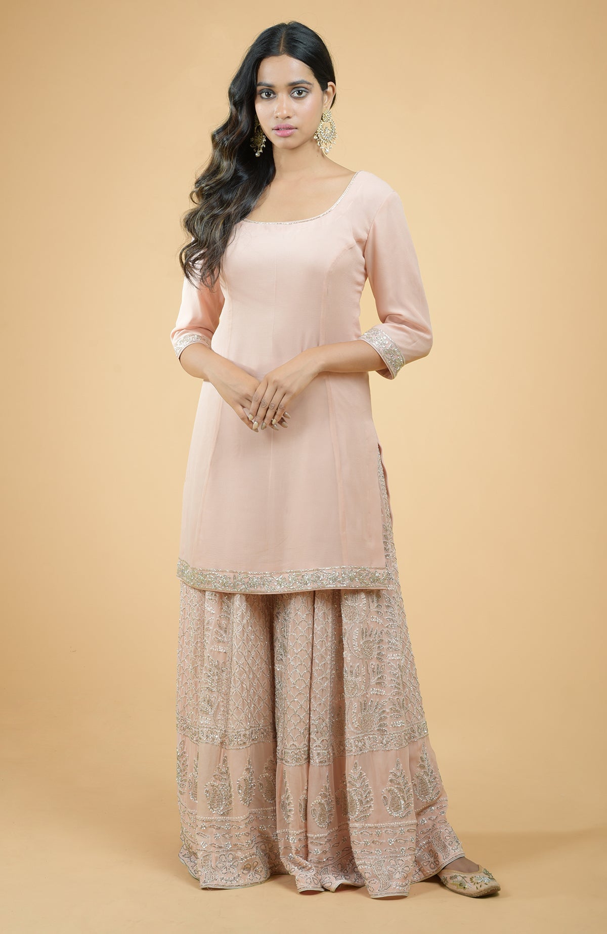 Nude pink sharara set with hand-embroidered chikankari, beads, and sequin zardozi details
