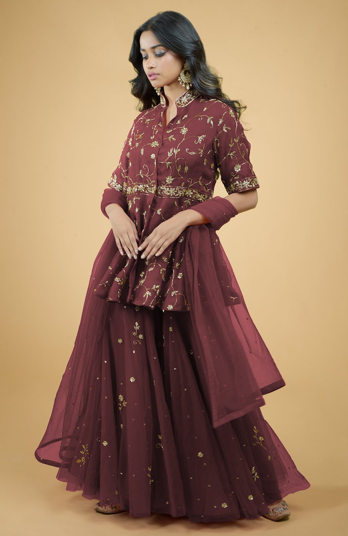 Marsala sharara set with gold bead and sequin zardozi embroidery and sheer organza peplum top