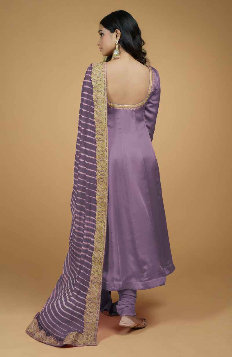 Lavender Anarkali set with a Leheriya-Tilla embroidered dupatta.