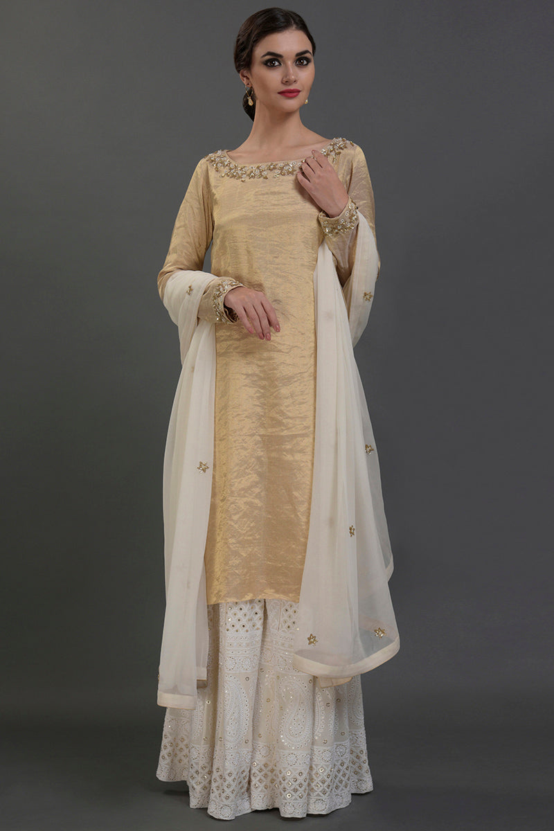 Ivory-gold silk tissue kurta with chikankari and zardozi embroidery paired with georgette sharara and dupatta