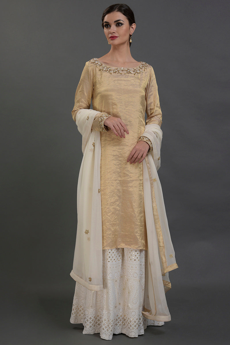 Ivory-gold silk tissue kurta with chikankari and zardozi embroidery paired with georgette sharara set