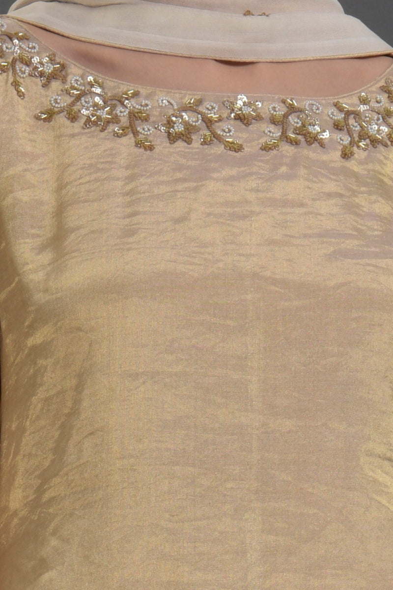 Ivory and gold silk tissue kurta with chikankari sharara and georgette dupatta set.