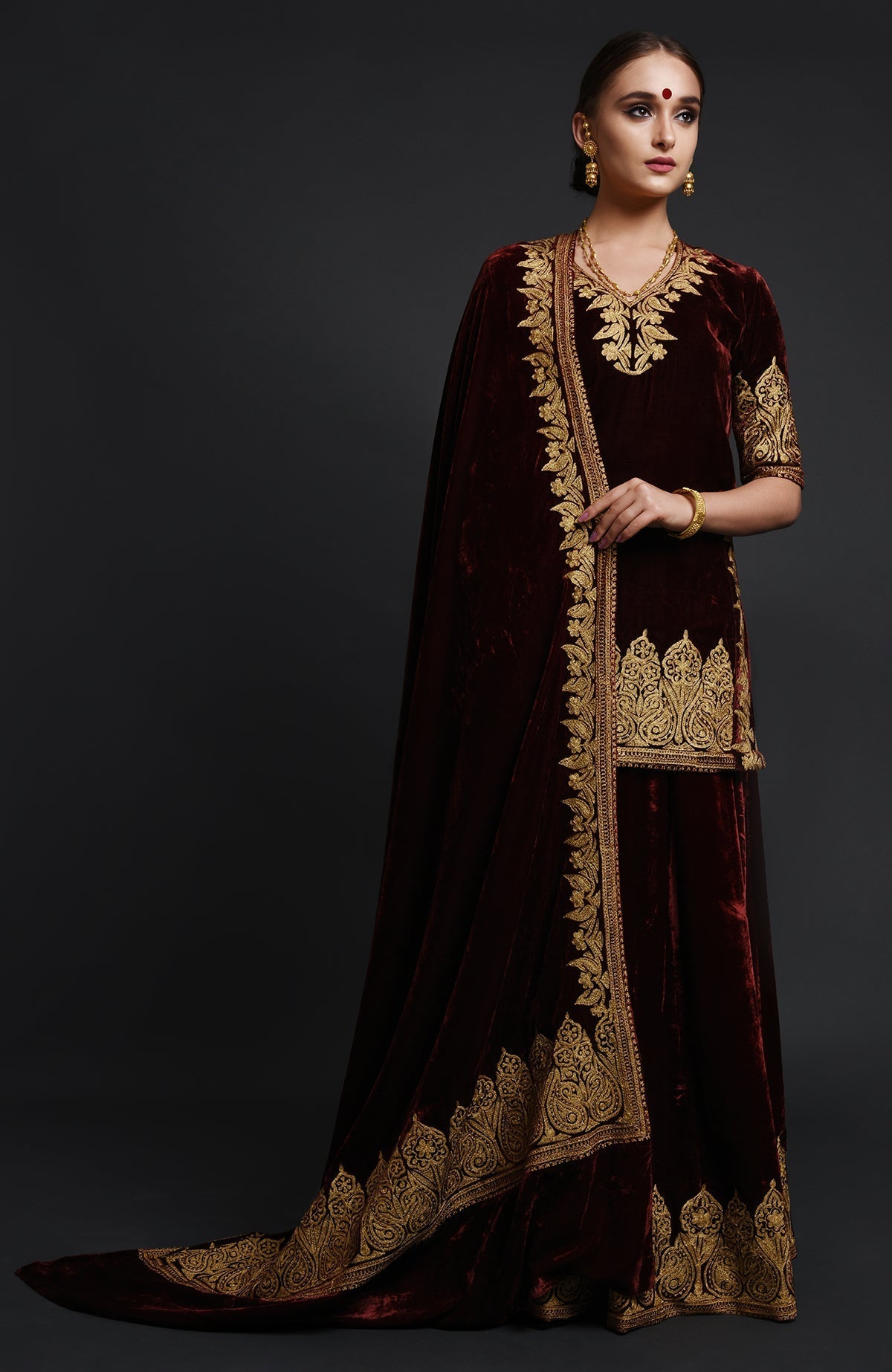 Burgundy silk velvet lehenga set with Kashmiri gold Tilla aari embroidery on all pieces
