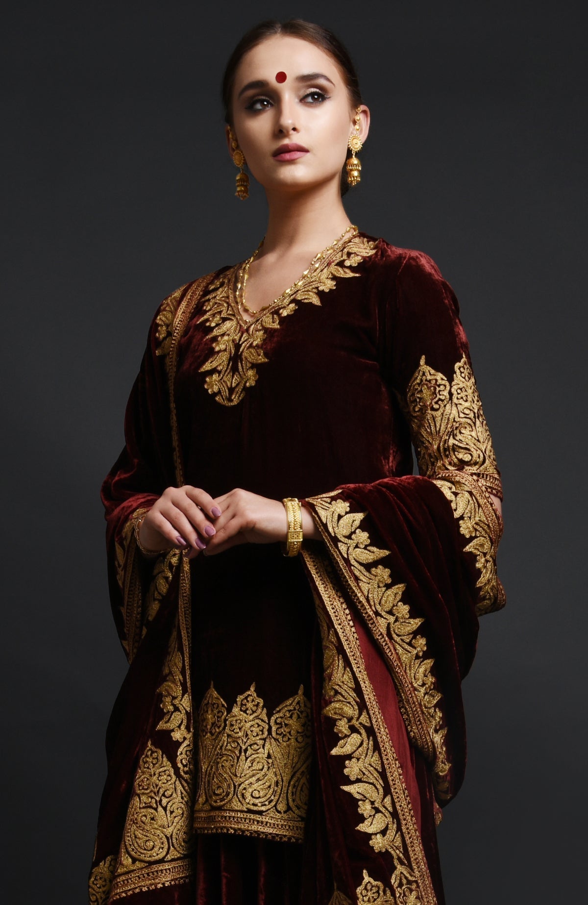 Burgundy silk velvet lehenga set with Kashmiri gold Tilla aari embroidery on all pieces
