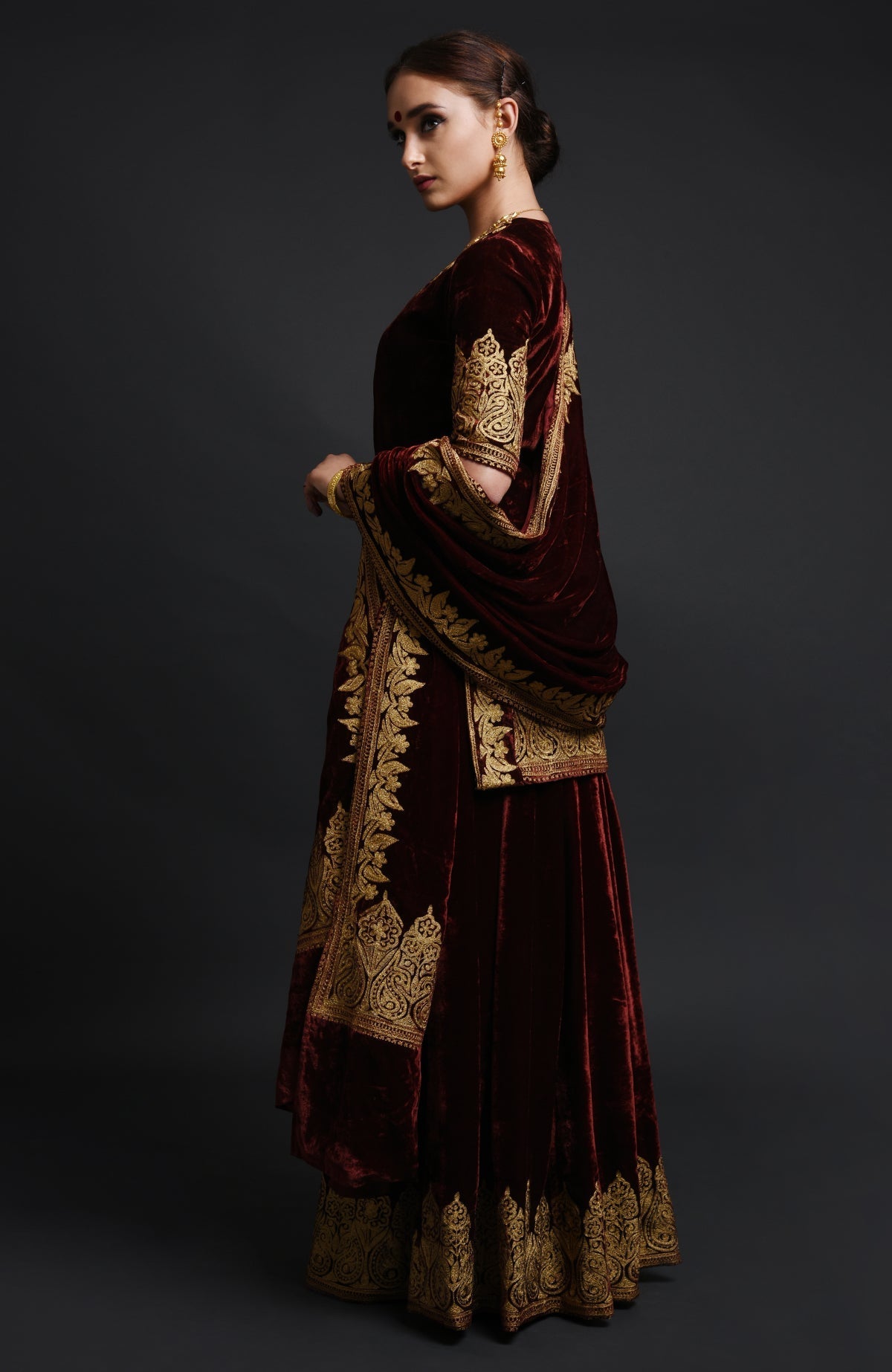 Burgundy silk velvet lehenga set with Kashmiri gold Tilla aari embroidery on all pieces