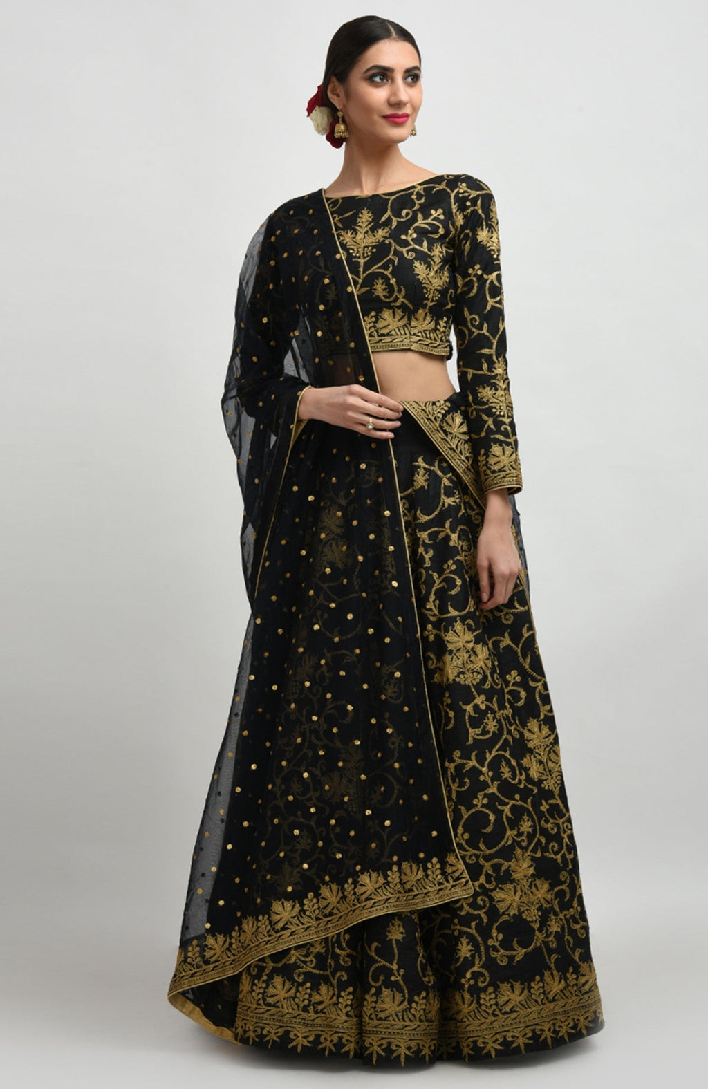 Black raw silk lehenga set with gold Kashmiri tilla aari embroidery and net dupatta.