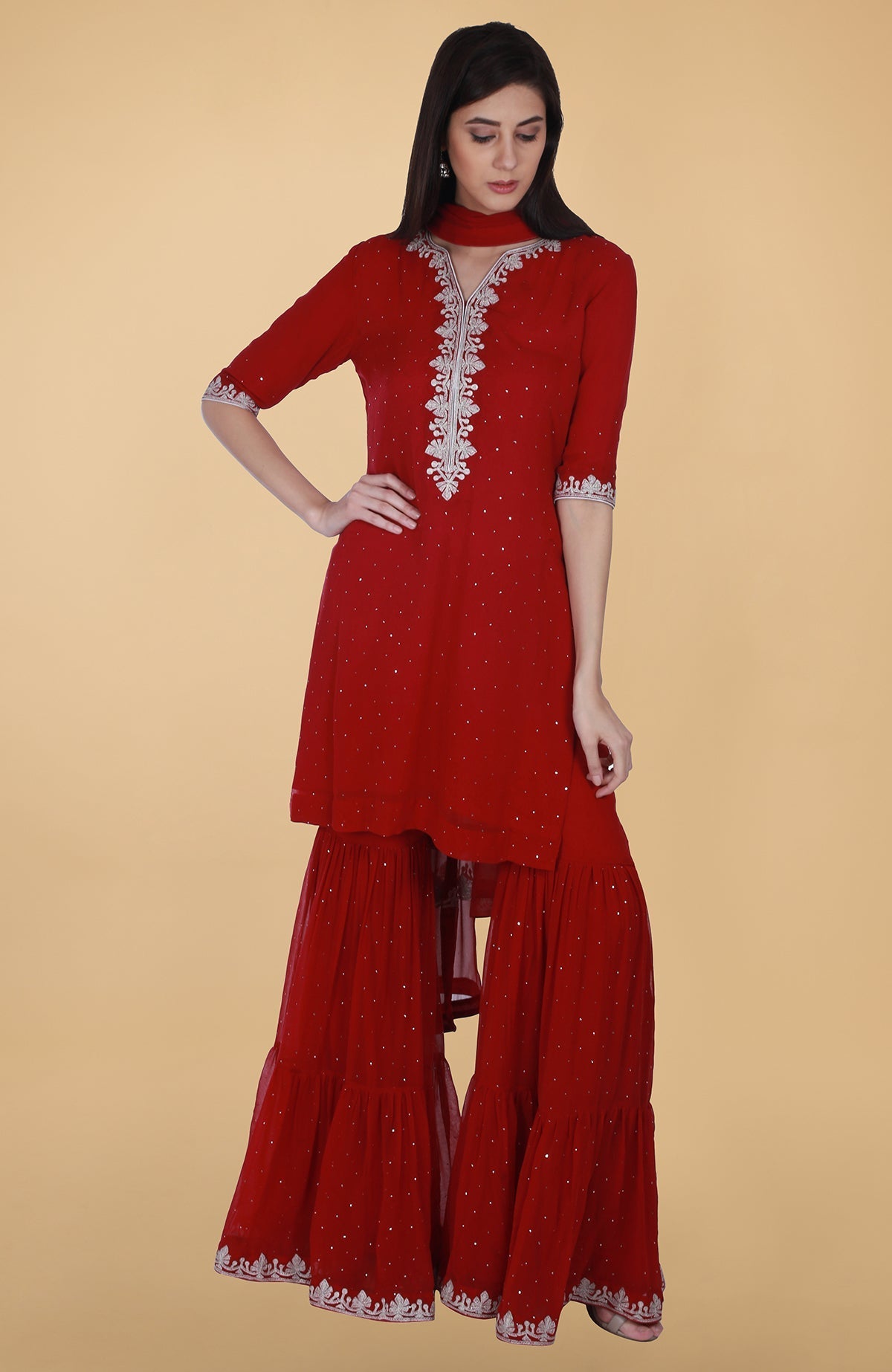 Burgundy georgette gharara suit with silver tilla and mukaish embroidery and straight cut kurta