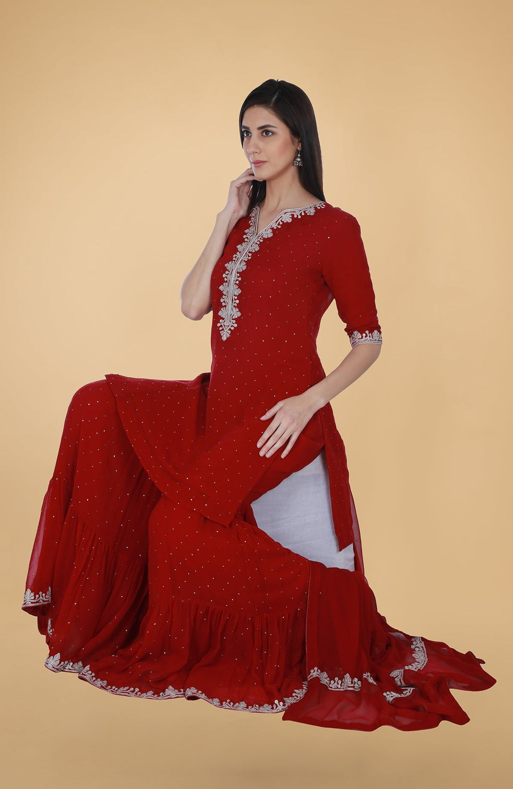 Scarlet red georgette gharara suit with silver tilla and mukaish embroidery and straight cut kurta