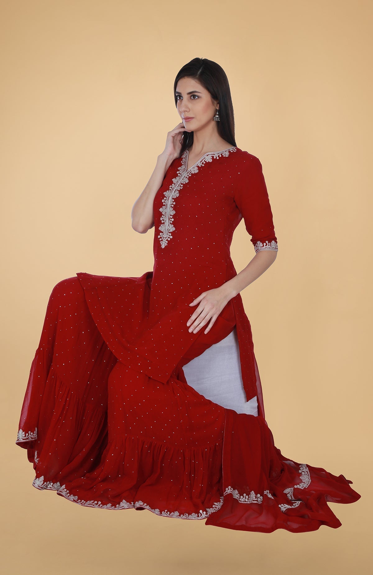 Scarlet red georgette gharara suit with silver tilla and mukaish embroidery and straight cut kurta