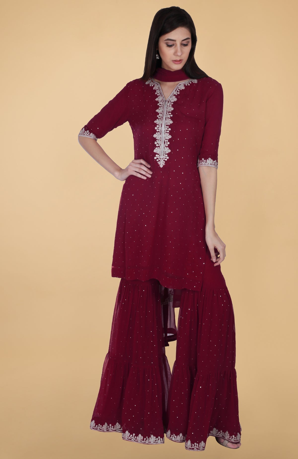 Burgundy georgette gharara suit with silver tilla and mukaish embroidery and straight cut kurta