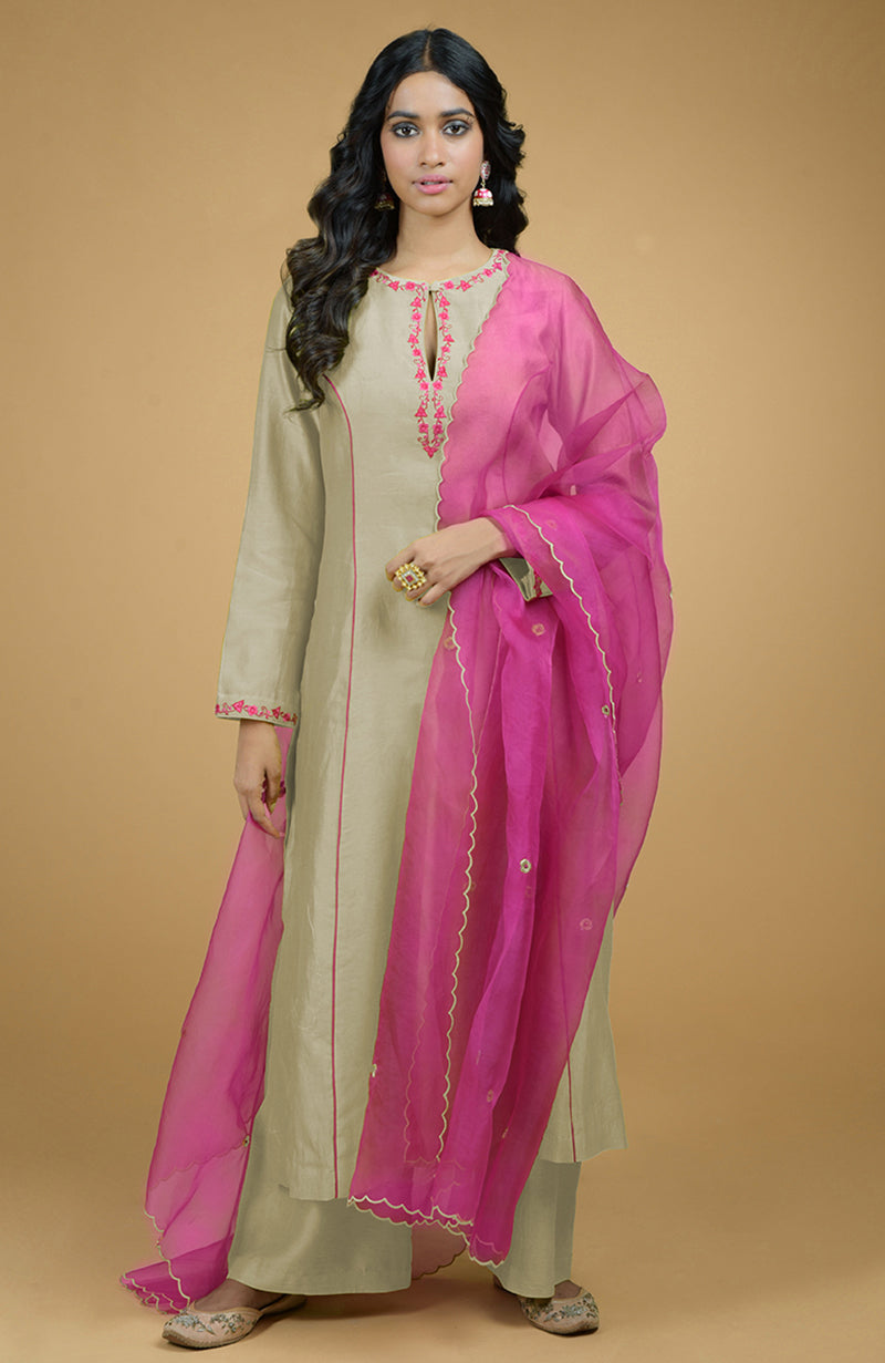 Lime green chanderi silk kurta with magenta piping and floral embroidered organza dupatta.