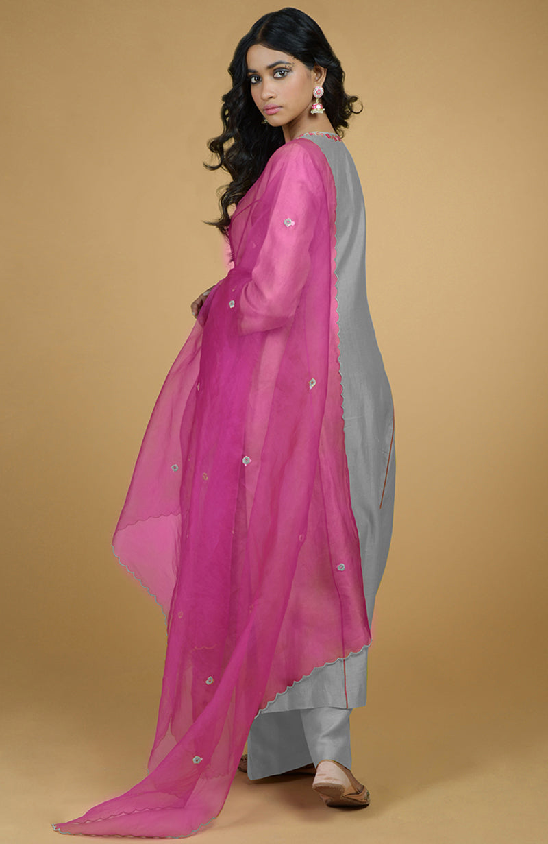 Ash grey kurta set with a magenta organza dupatta featuring lime green embroidery.