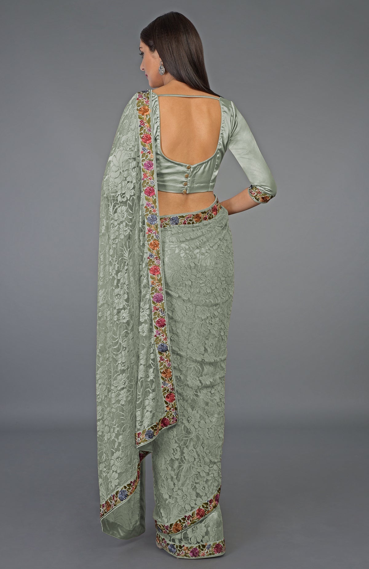 Desert sage French Chantilly lace saree with multicolor Parsi Gara embroidery and Swarovski crystals.