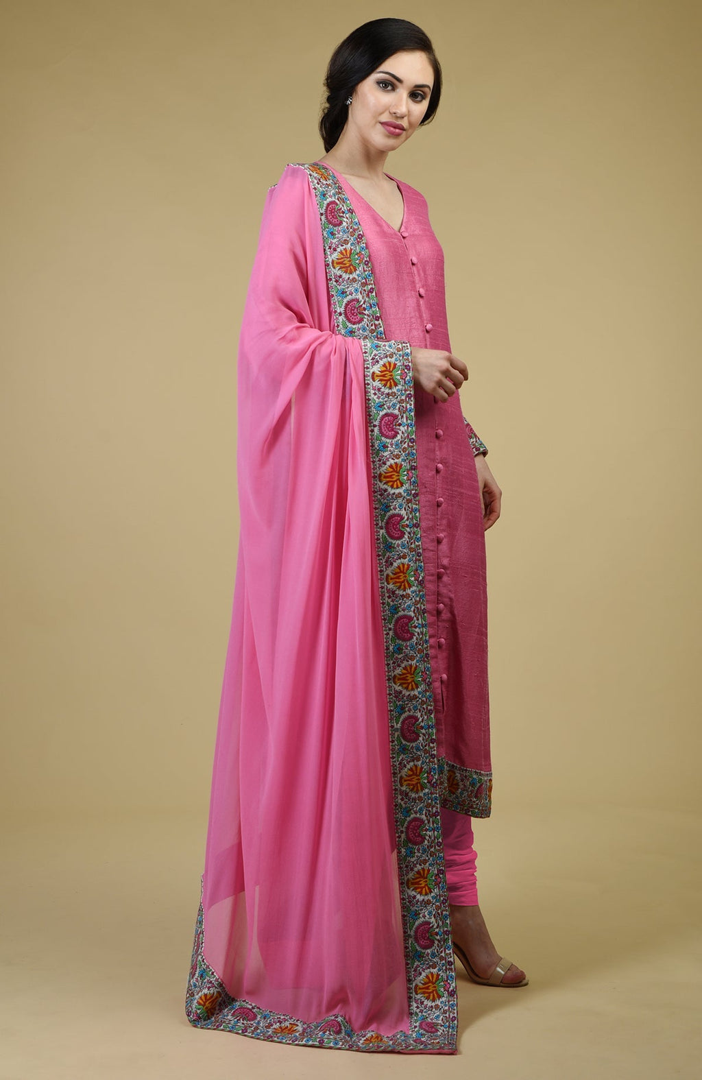 Carnation pink raw silk suit with Kashmiri hand embroidery on kurta and dupatta borders.