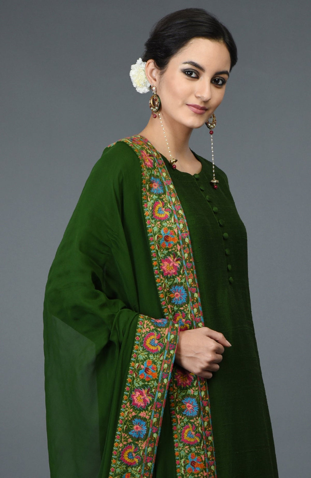 Moss green raw silk suit with multicolor Kashmiri hand embroidery and georgette dupatta borders