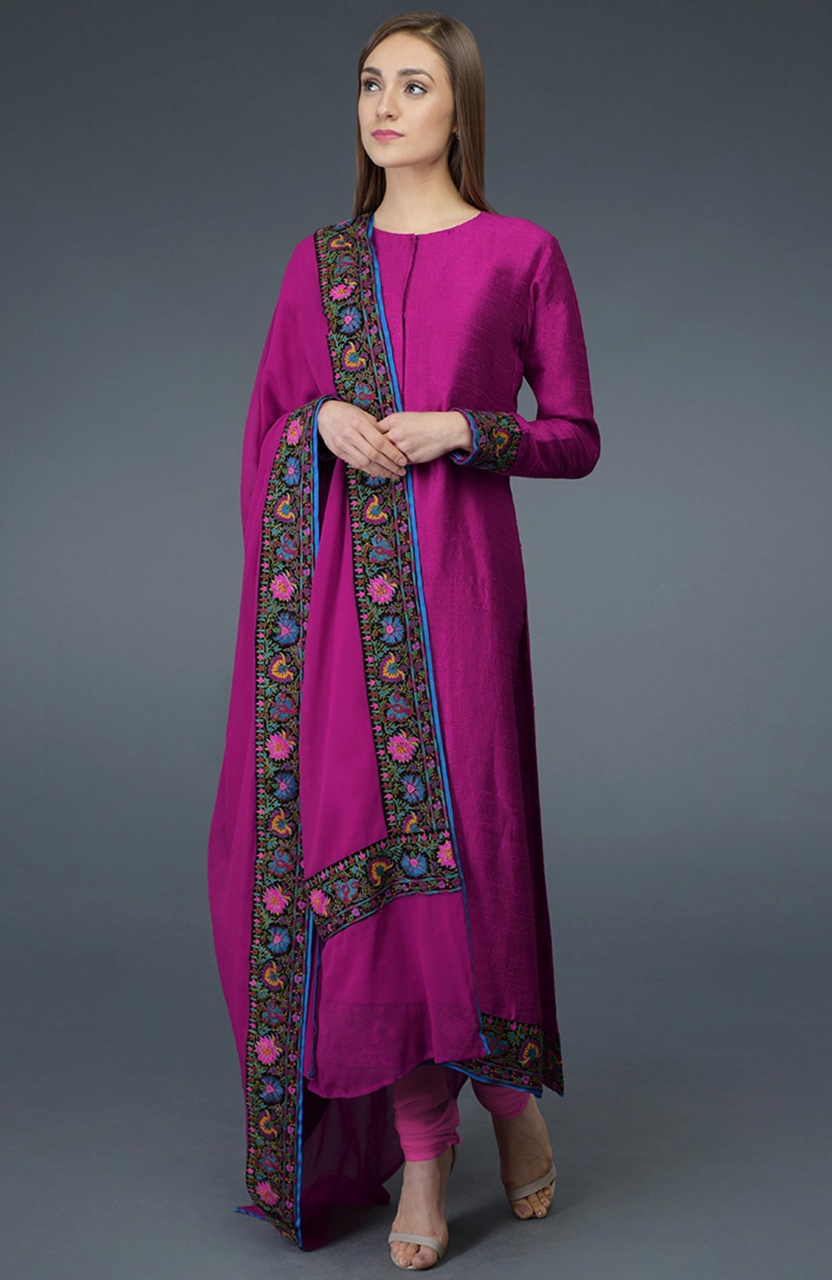 Orchid raw silk suit with multicolor Kashmiri hand embroidery and georgette dupatta borders.