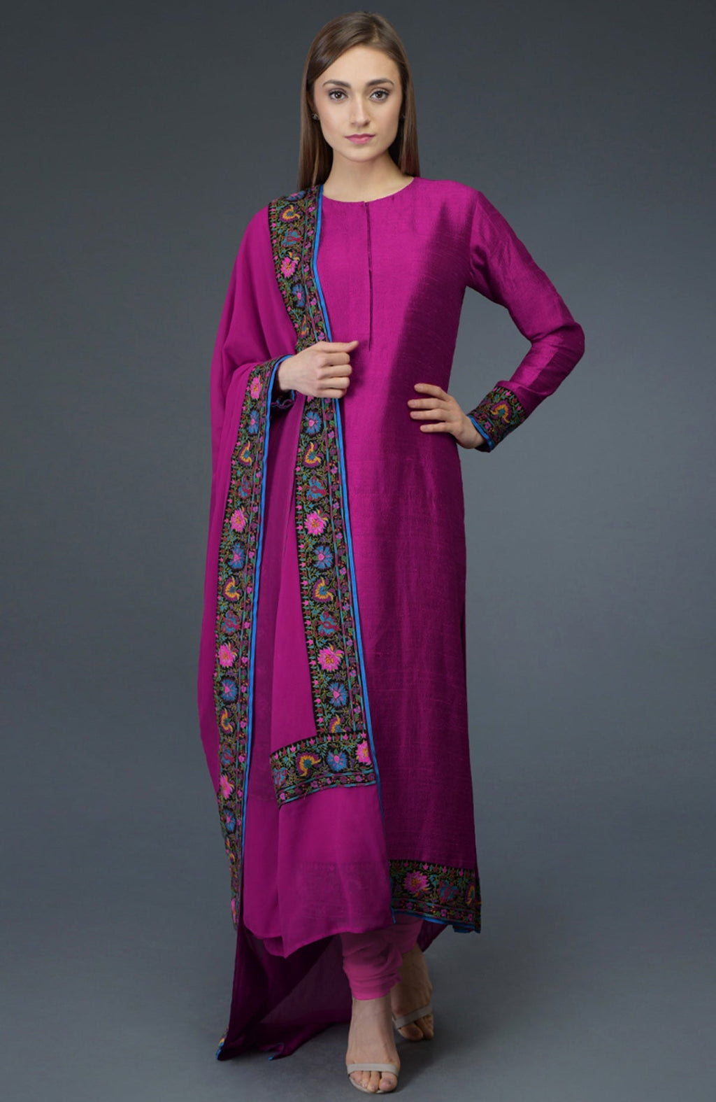 Orchid raw silk suit with multicolor Kashmiri hand embroidery and georgette dupatta borders.