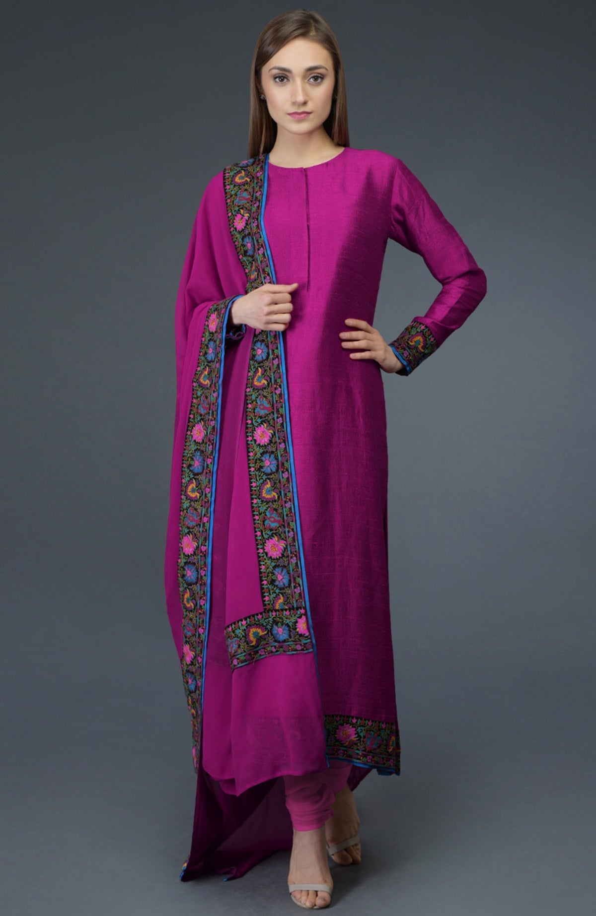 Orchid raw silk suit with multicolor Kashmiri hand embroidery and georgette dupatta borders.