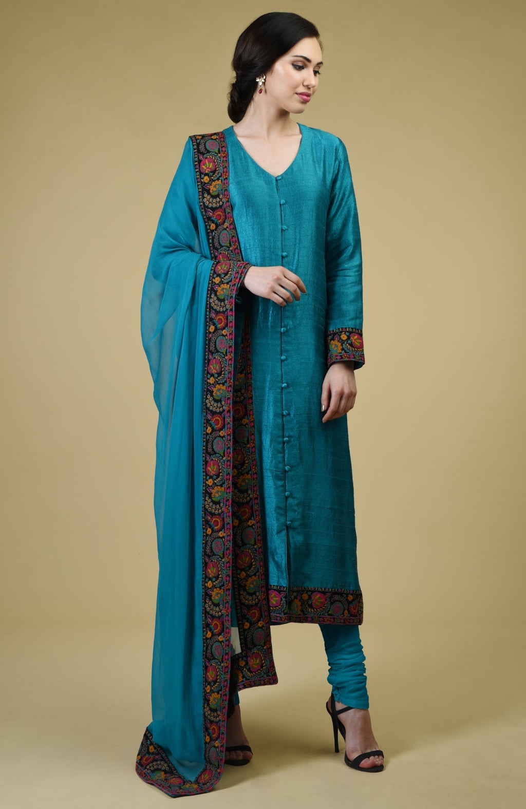 Teal blue raw silk suit with hand embroidered Kashmiri kashidakari kurta and georgette dupatta.