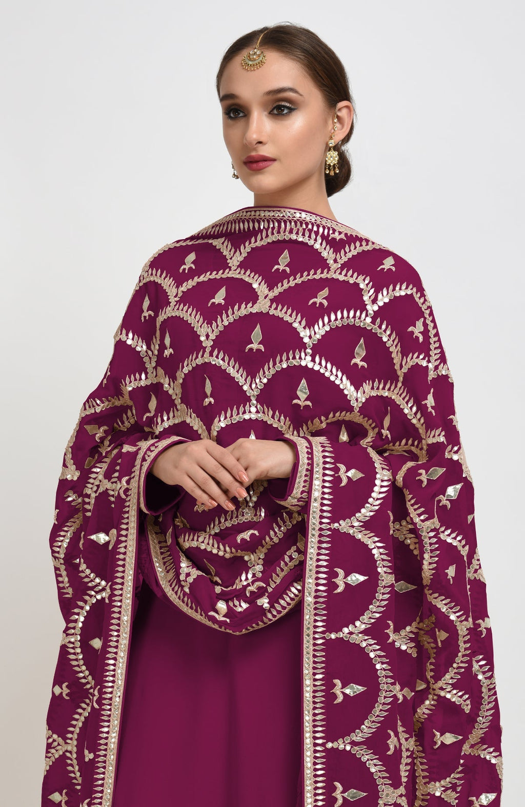 Peacock pink suit with rose gold gota patti hand embroidery and scalloped dupatta borders.