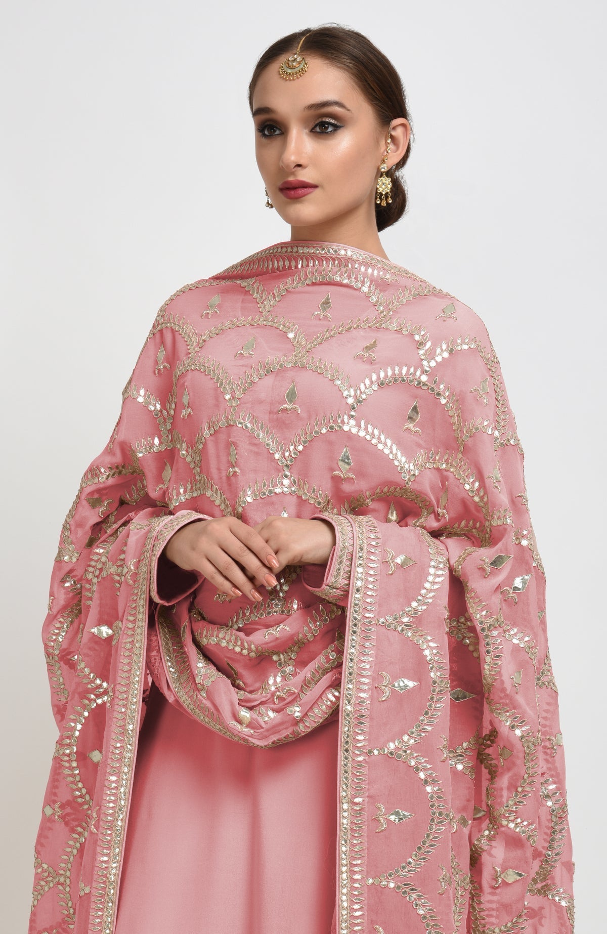 Rose tan suit with rose gold gota patti hand embroidery on dupatta and shirt neckline.