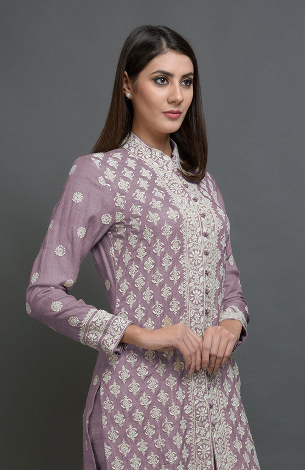 Elderberry tussar silk jacket suit with ivory Chikankari embroidery and band collar neckline.