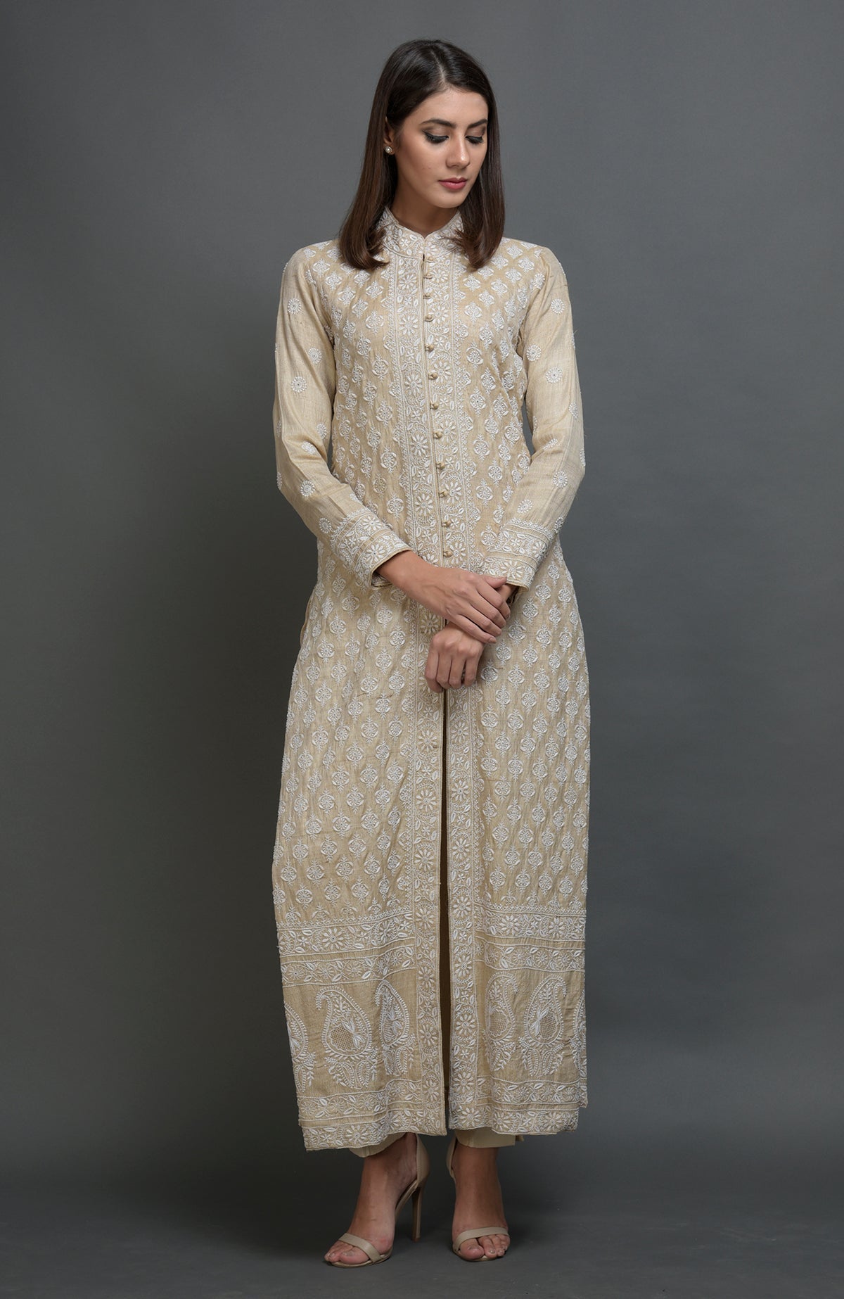 Champagne beige chikankari embroidered jacket suit with band collar and front hook closures