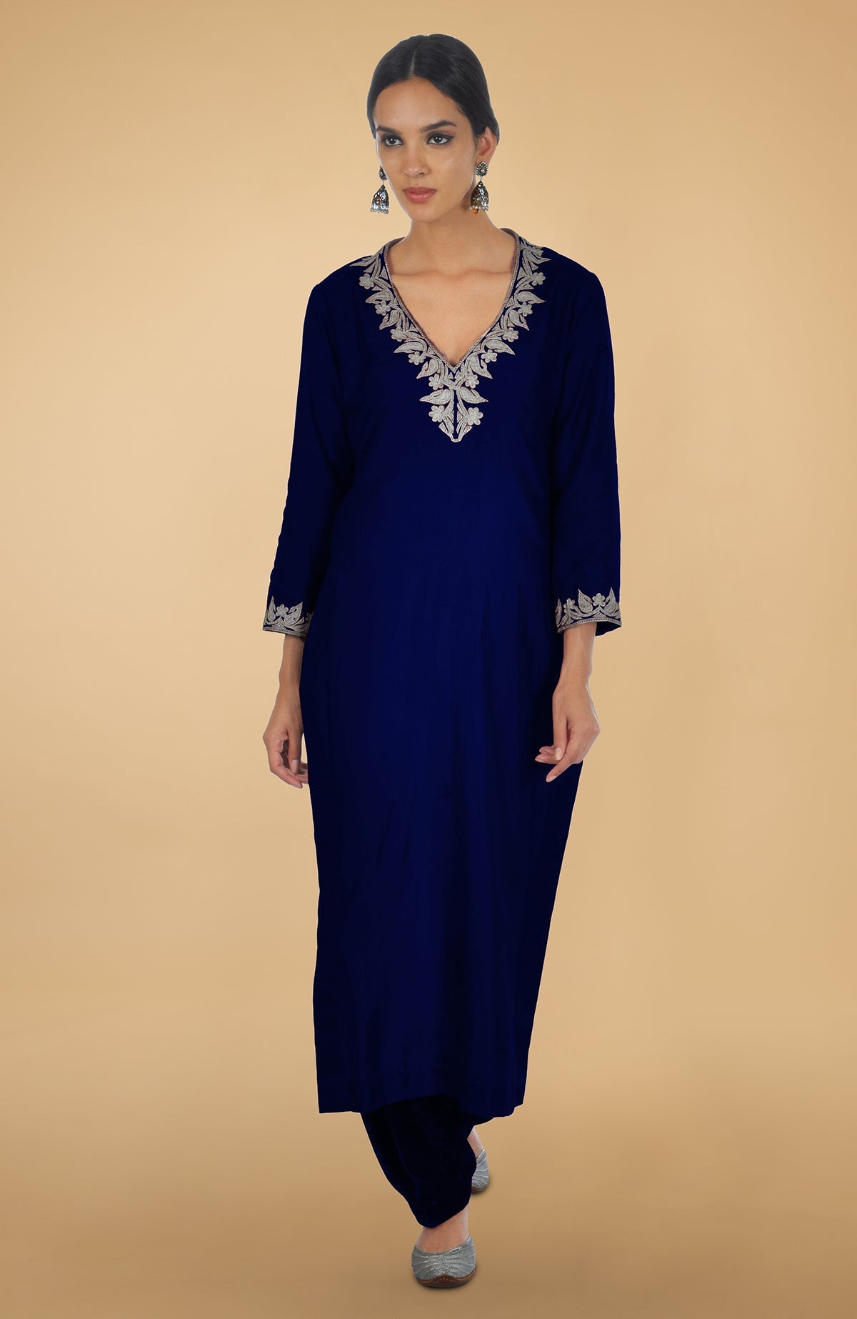 Electric blue silk kurta set with silver Kashmiri Tilla aari embroidery and velvet salwaris.