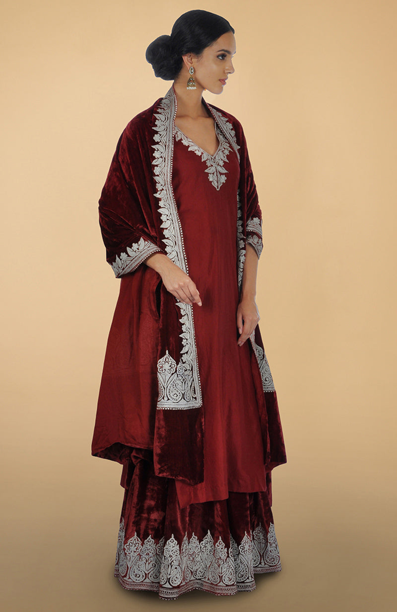 Burgundy silk lehenga set with silver Kashmiri Tilla Aari embroidery on kurta, lehenga, and dupatta