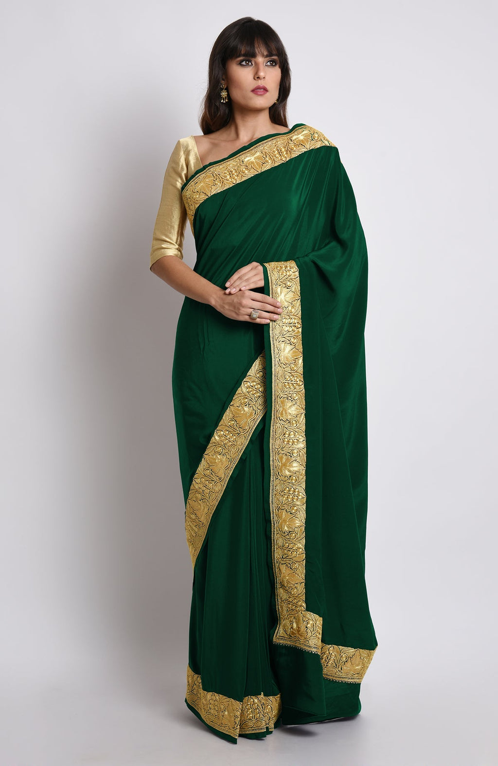 Emerald pure crepe saree with gold Kashmiri tilla embroidery on pallav and borders